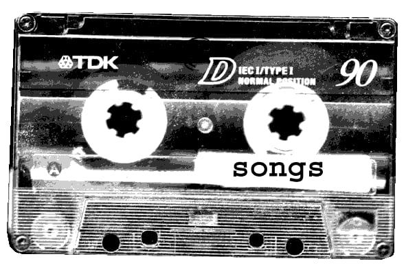 A TDK cassette with the word songs written on the label.
